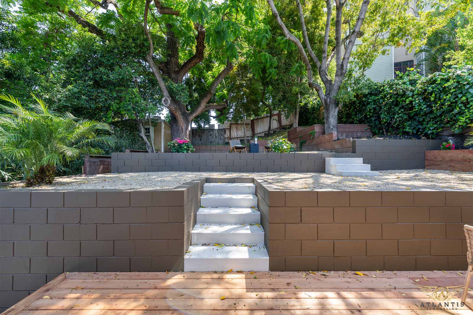 Landscaped backyard with retaining walls