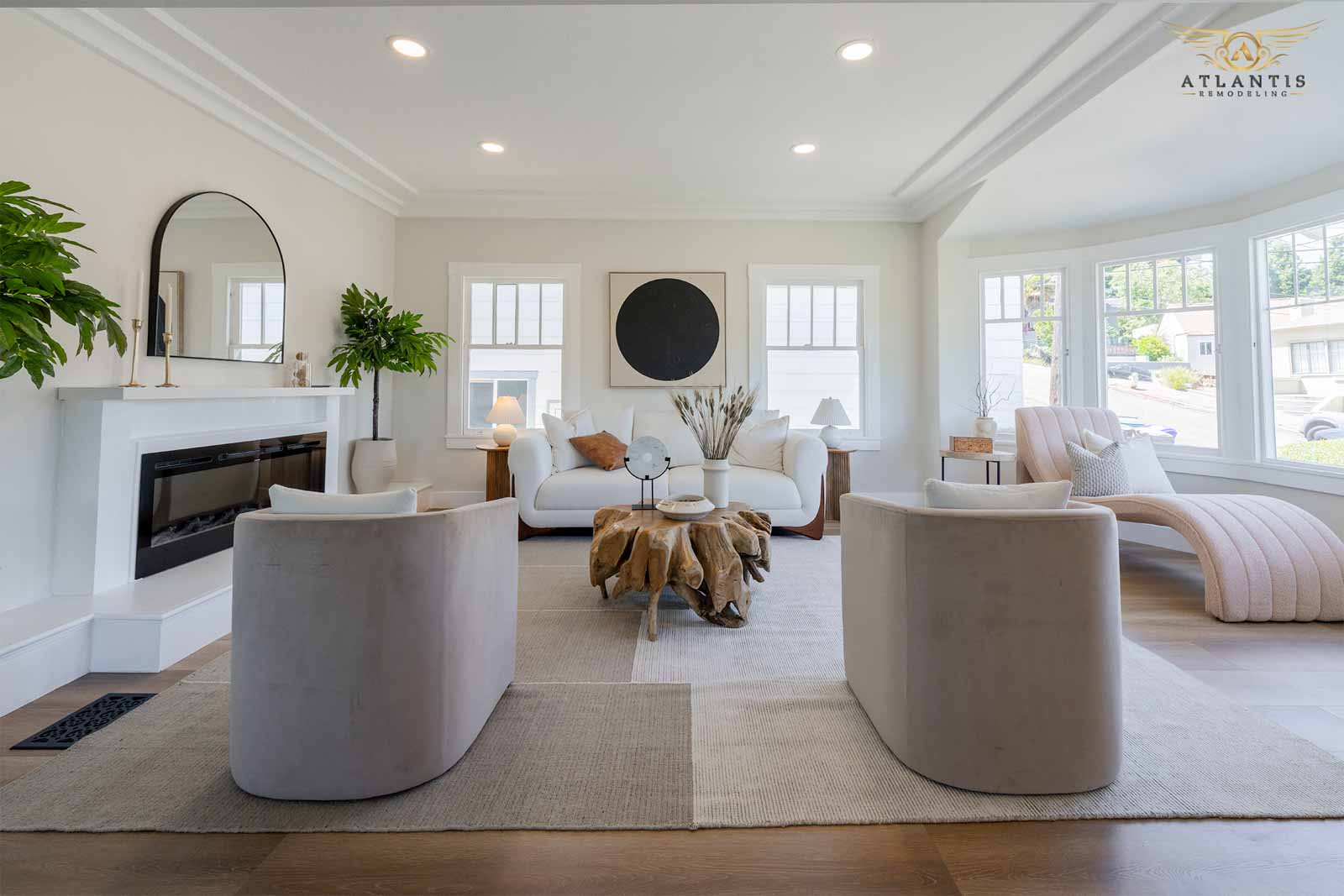 Beautiful whole home remodel featuring modern living room with fireplace and open-concept design