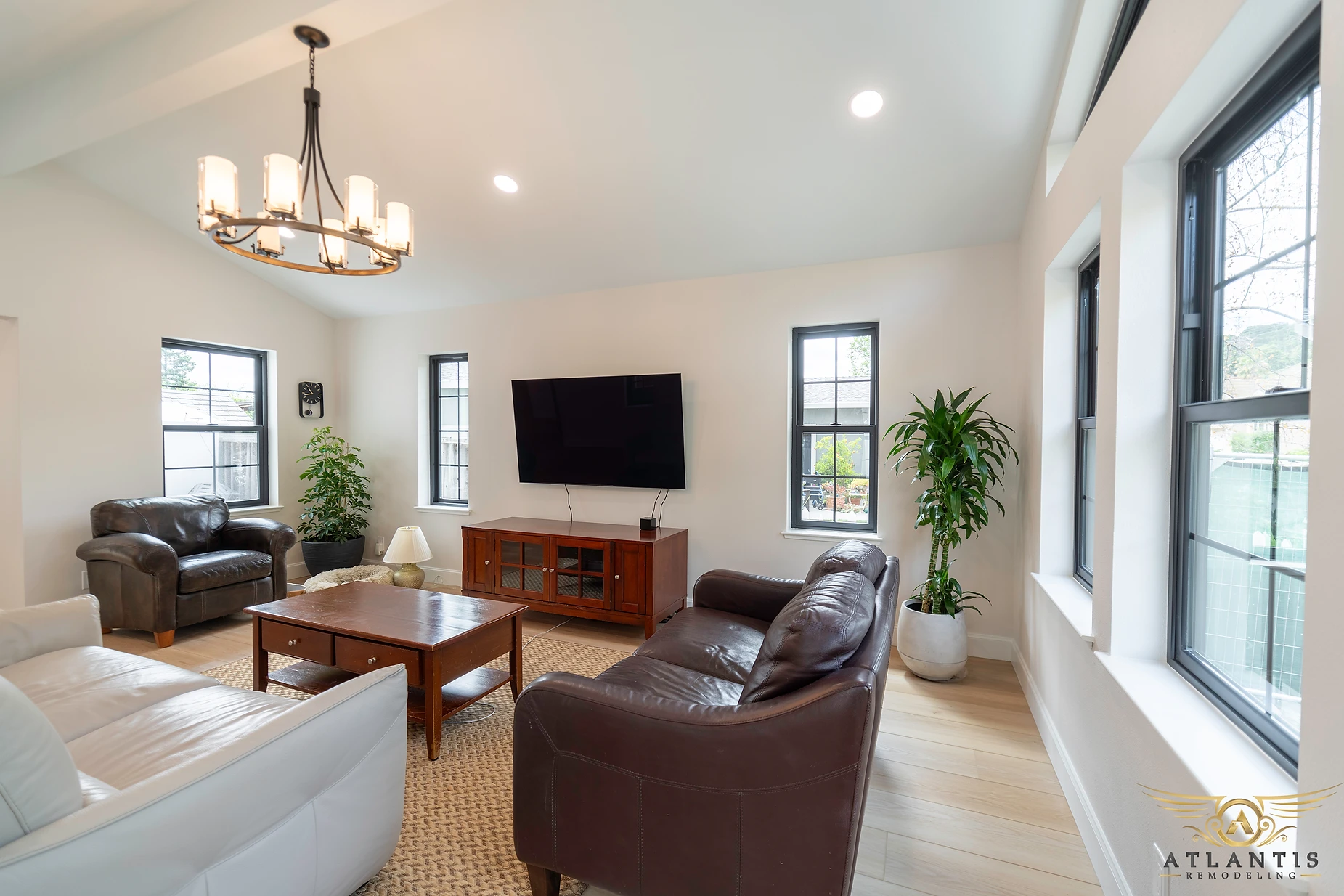 Vaulted ceiling family room addition with expansive windows