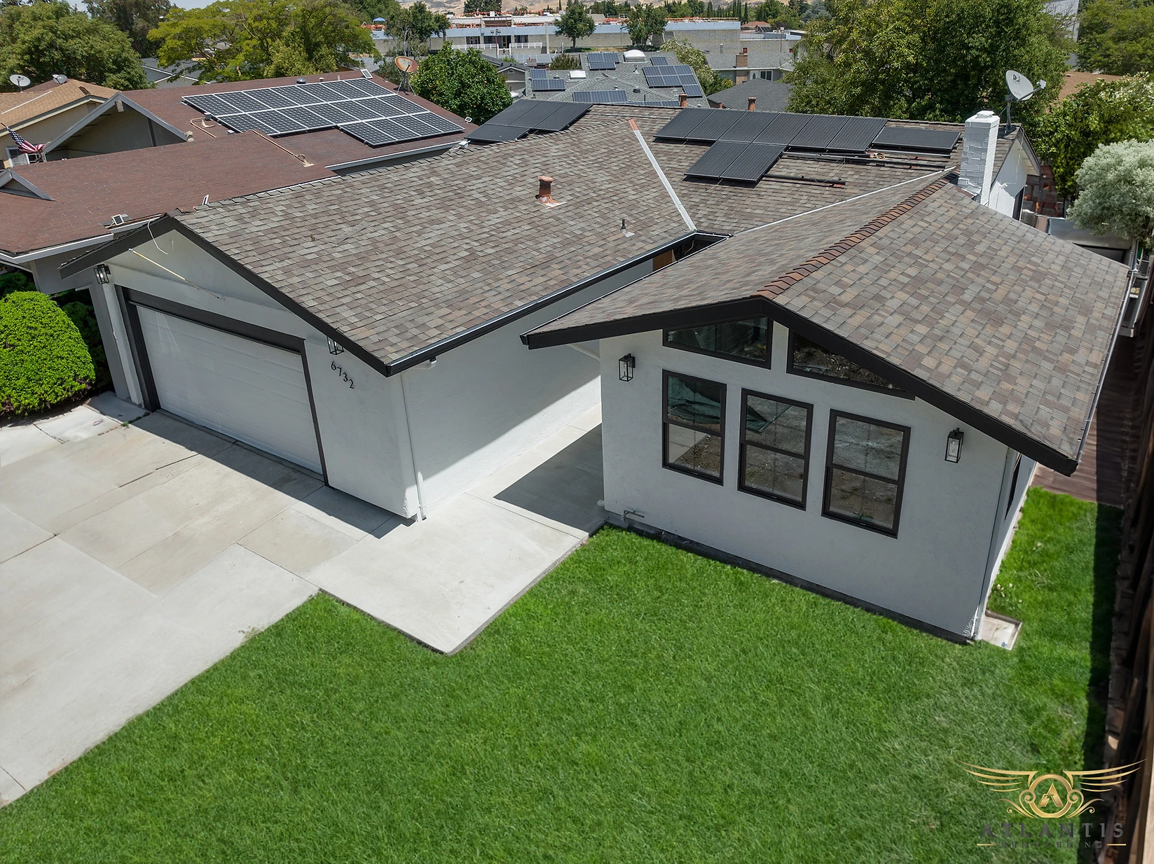 Aerial view of room addition showing seamless integration with existing home